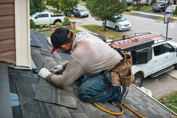 Professional Roofing technician working in South Farmingdale, NY